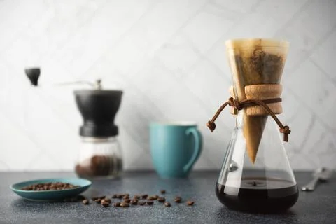 Preparing Drip Coffee - Coffee Dripping through saturated Filter Stock Photos