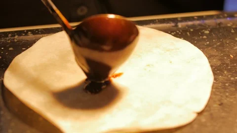 Preparing duck wrap with brown sauce and scalions 스톡 동영상 94928231