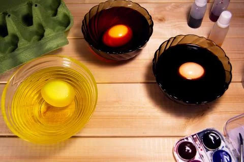 Preparing for the Easter. Egg coloring process Stock Photos