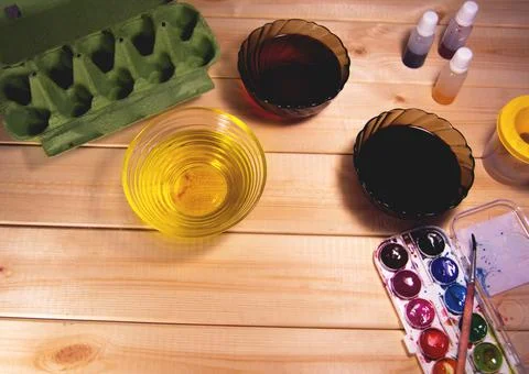 Preparing for Easter. Paint, container for eggs Stock Photos