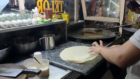 Preparing egg martabak dough Stock Footage 219171998