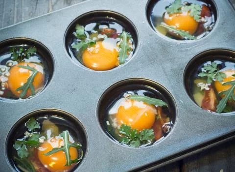 Preparing egg muffins Stock Photos