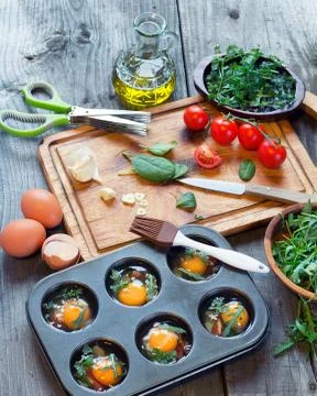 Preparing egg muffins Stock Photos