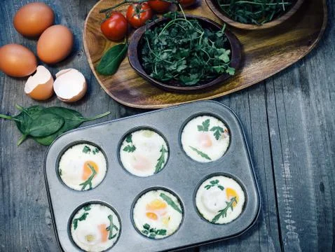 Preparing egg muffins Stock Photos