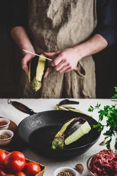 Preparing eggplants for baking and stuffing Stock Photos