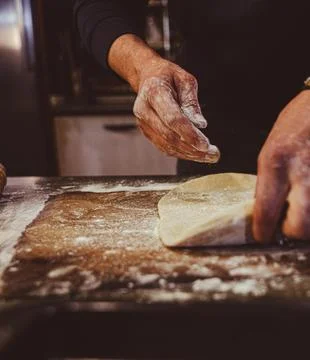 Preparing an empanada Stock Photos