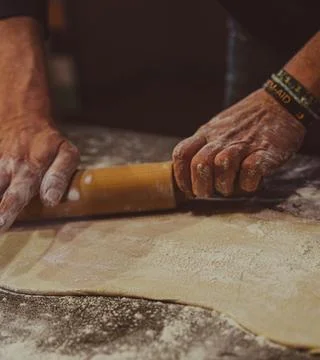 Preparing an empanada Stock Photos
