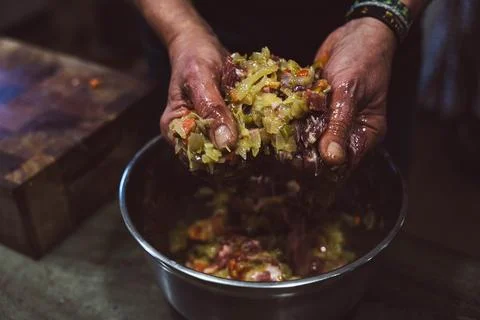 Preparing an empanada Stock Photos