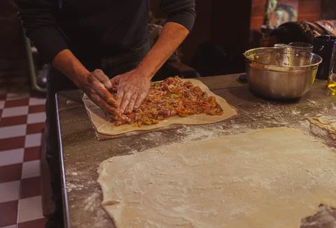 Preparing an empanada Stock Photos