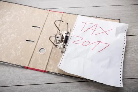 Preparing an empty file folder for the tax clearance 2017 Stock Photos