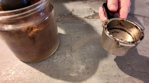 Preparing espresso with ground coffee and portafilter Stock Footage 345081111