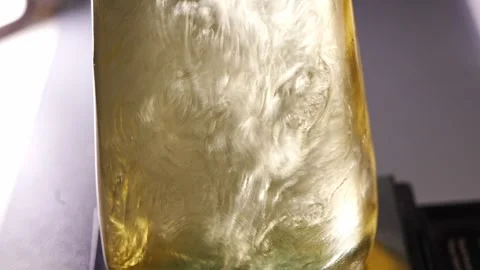 Preparing essential oil and alcohol diffuser liquid Stockbeeldmateriaal 336558395