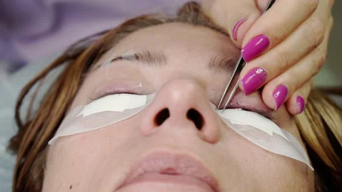Preparing the eyelids for eyelash extension. Stock Footage 164057876