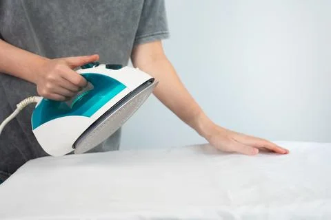 Preparing Fabric for Ironing Stock Photos