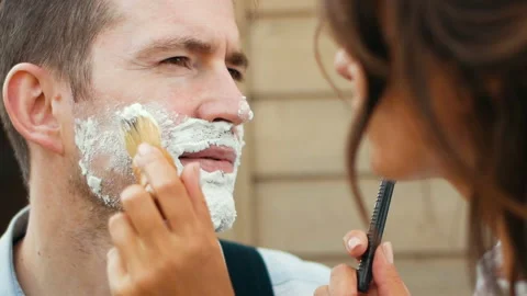 Preparing face with shave foam close-up applying Stock Footage 100114166