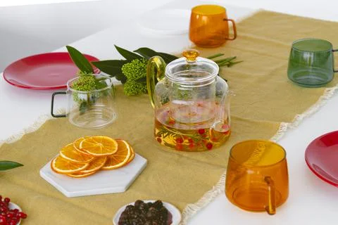 Preparing a festive table for tea drinking. Holiday table decorated. Stock Photos