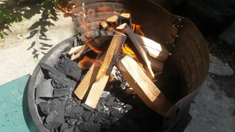 Preparing fire for a barbecue Stock-Footage 136541145