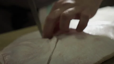 Preparing fish for baking 動画素材 163317044