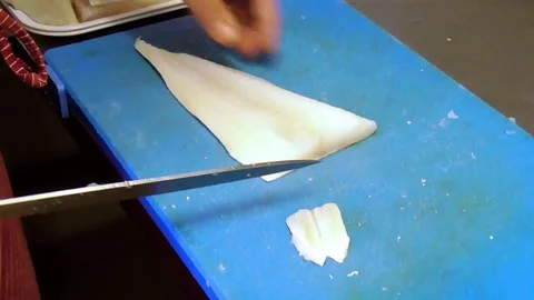 Preparing fish Stock Footage 96687393