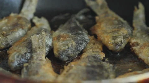 Preparing Fish in Frying Pan Stock Footage 6496973