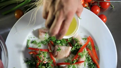 Preparing Fish on a Plate Stock Footage 49698430