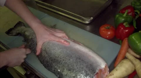 The preparing of fish in a restaurant kitchen Stock Footage 11286085