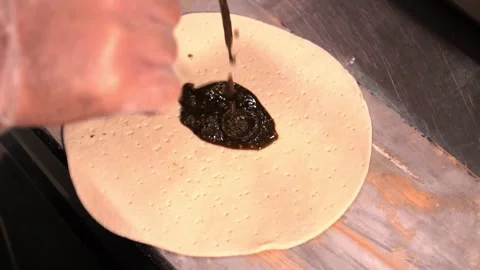Preparing Flatbread with Sauce Stock Footage 319207577