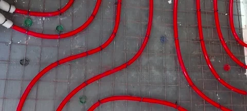 Preparing the floor for concreting. Underfloor heating laid on the floor Stock Footage 320193350