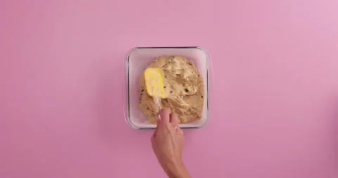 Preparing with flour, eggs, blueberries, sugar and serving blueberry blondie bro Stock Footage 133816701