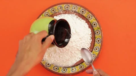 Preparing flour mixture with water Stock Footage 242962865