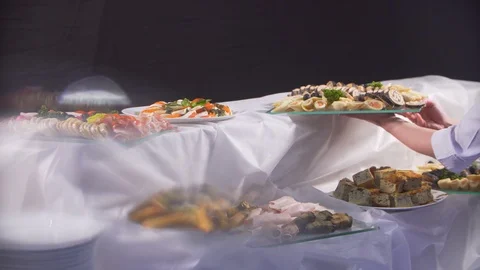 Preparing food for a big event, a lot of snacks, cooks prepare Stock Footage 116679110