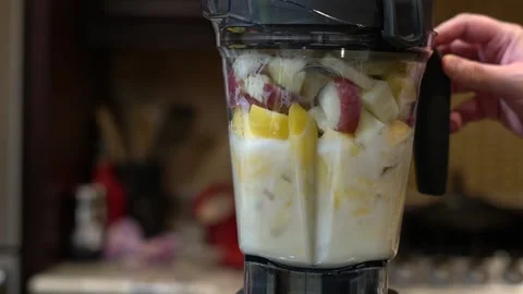 Preparing Food In A Blender In A Kitchen Video stock 139769779