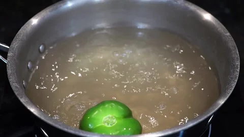 Preparing Food In Boiling Water In A Kitchen Stock Footage 139723977