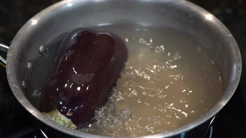 Preparing Food In Boiling Water In A Kitchen Video stock 139724163