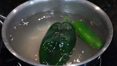 Preparing Food In Boiling Water In A Kitchen Video stock 139724329