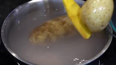 Preparing Food In Boiling Water In A Kitchen Video stock 139724641