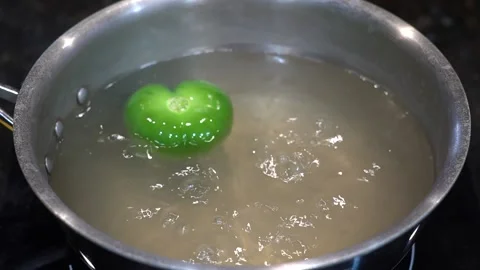 Preparing Food In Boiling Water In A Kitchen Stock Footage 139724865