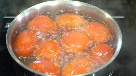 Preparing Food In Boiling Water In A Kitchen Stock Footage 139769524