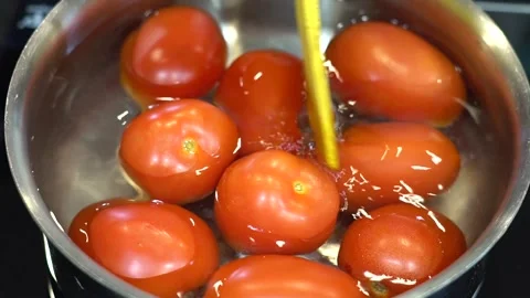 Preparing Food In Boiling Water In A Kitchen Stock Footage 139769526
