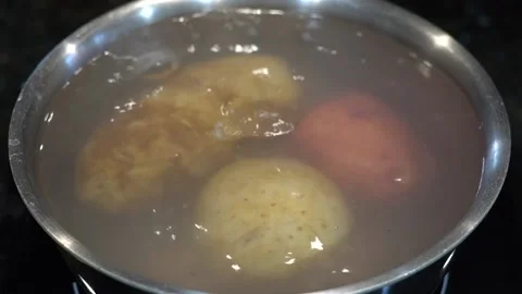Preparing Food In Boiling Water In A Kitchen Stock Footage 139769551