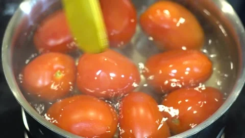 Preparing Food In Boiling Water In A Kitchen Stock Footage 139769870