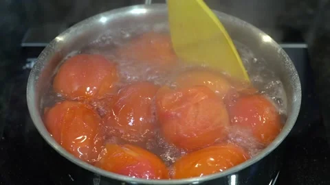 Preparing Food In Boiling Water In A Kitchen Stock Footage 139769871