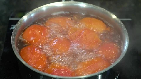 Preparing Food In Boiling Water In A Kitchen Stock Footage 139769896