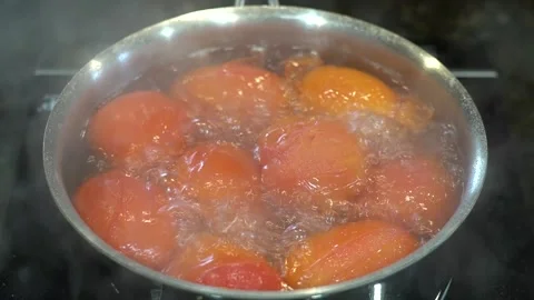 Preparing Food In Boiling Water In A Kitchen Stock Footage 139769904