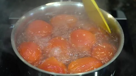 Preparing Food In Boiling Water In A Kitchen Stock Footage 139769938