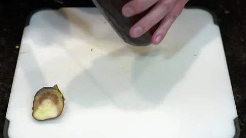Preparing Food By Cutting On A Plastic Cutting Board In A Kitchen Stock Footage 139769953
