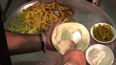 Preparing Food with Flatbread and Condiments Video stock 319207621