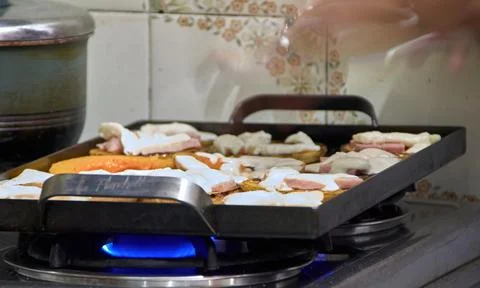 Preparing food in the kitchen Stock Photos