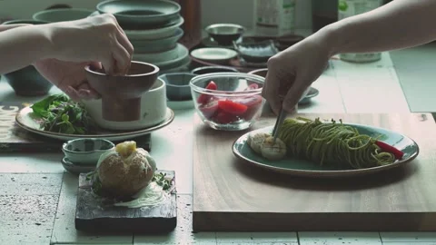 Preparing Food on Kitchen Table Stock Footage 334172123