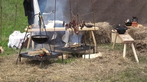 Preparing food in pot over the fire Stock Footage 64765673
